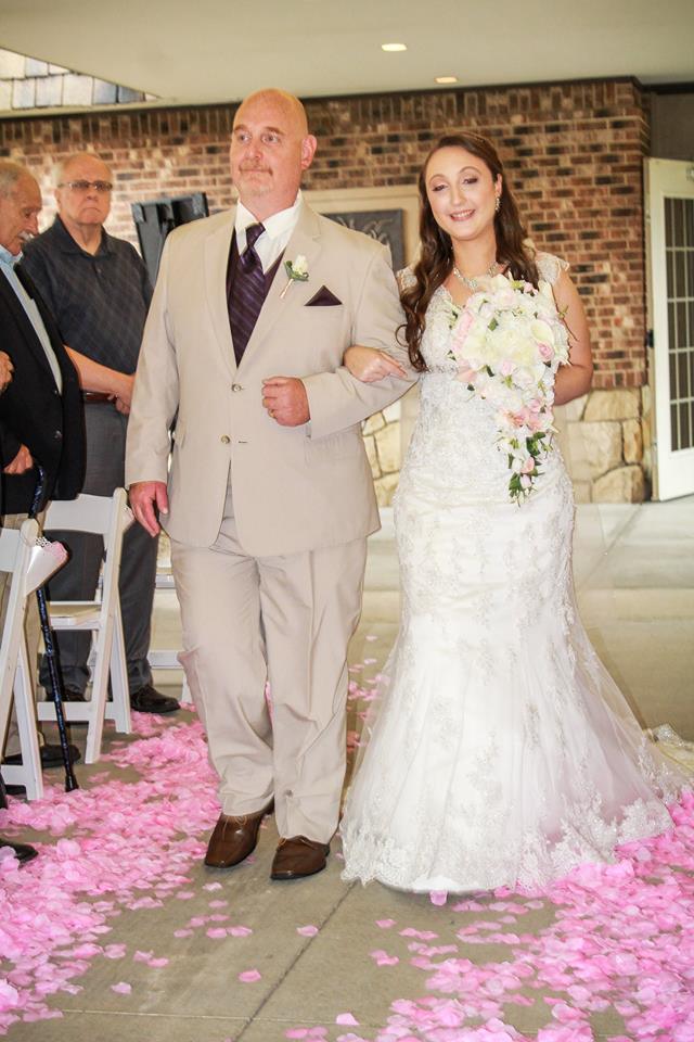 father walking bride down the aisle for her wedding at the chadwick