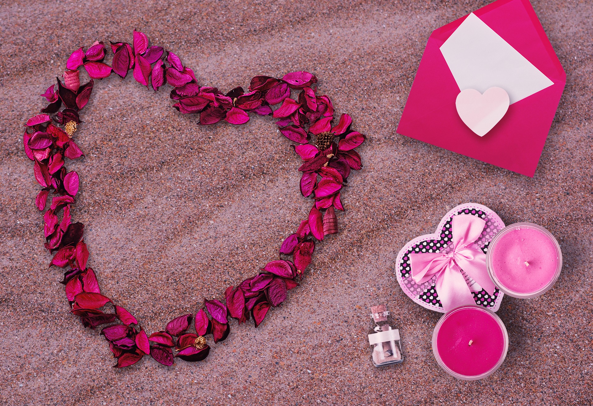 beach flowers pink petals sand wedding