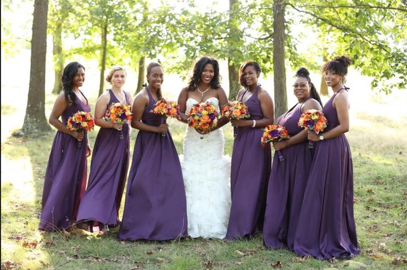 bride with bridesmaids plum fall flowers at chestnut ridge golf resort