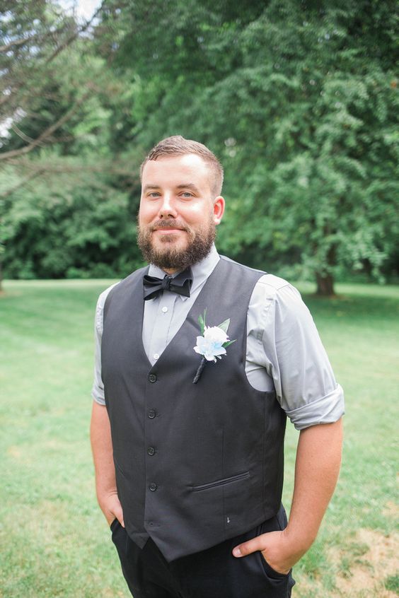 groom with boutonniere summer wedding at foggy mountain lodge