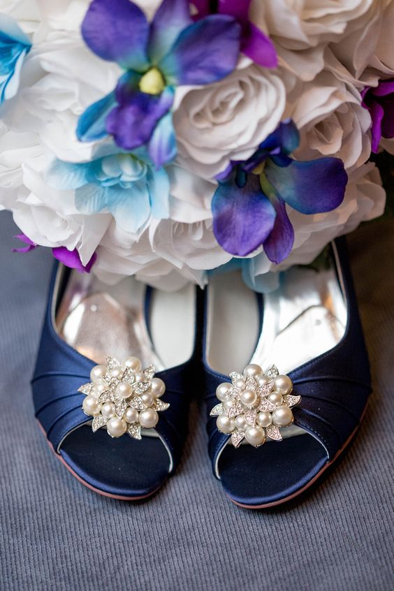 navy wedding shoes and silk wedding bouquet of white roses and blue purple orchids